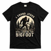 I Found Jesus Still Looking Bigfoot Retro Funny Christian T-Shirt - Black